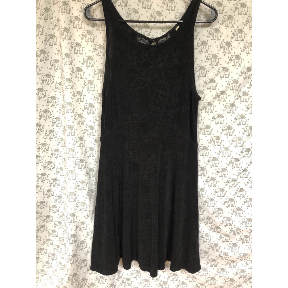 NWOT Free People Black Floral Back-slit Lg.